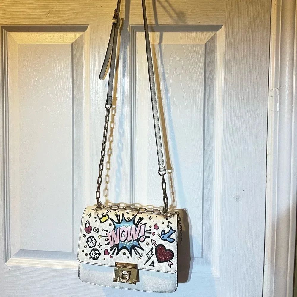 Aldo white synthetic with graffiti embroidery appliqué & studs crossbody bag.